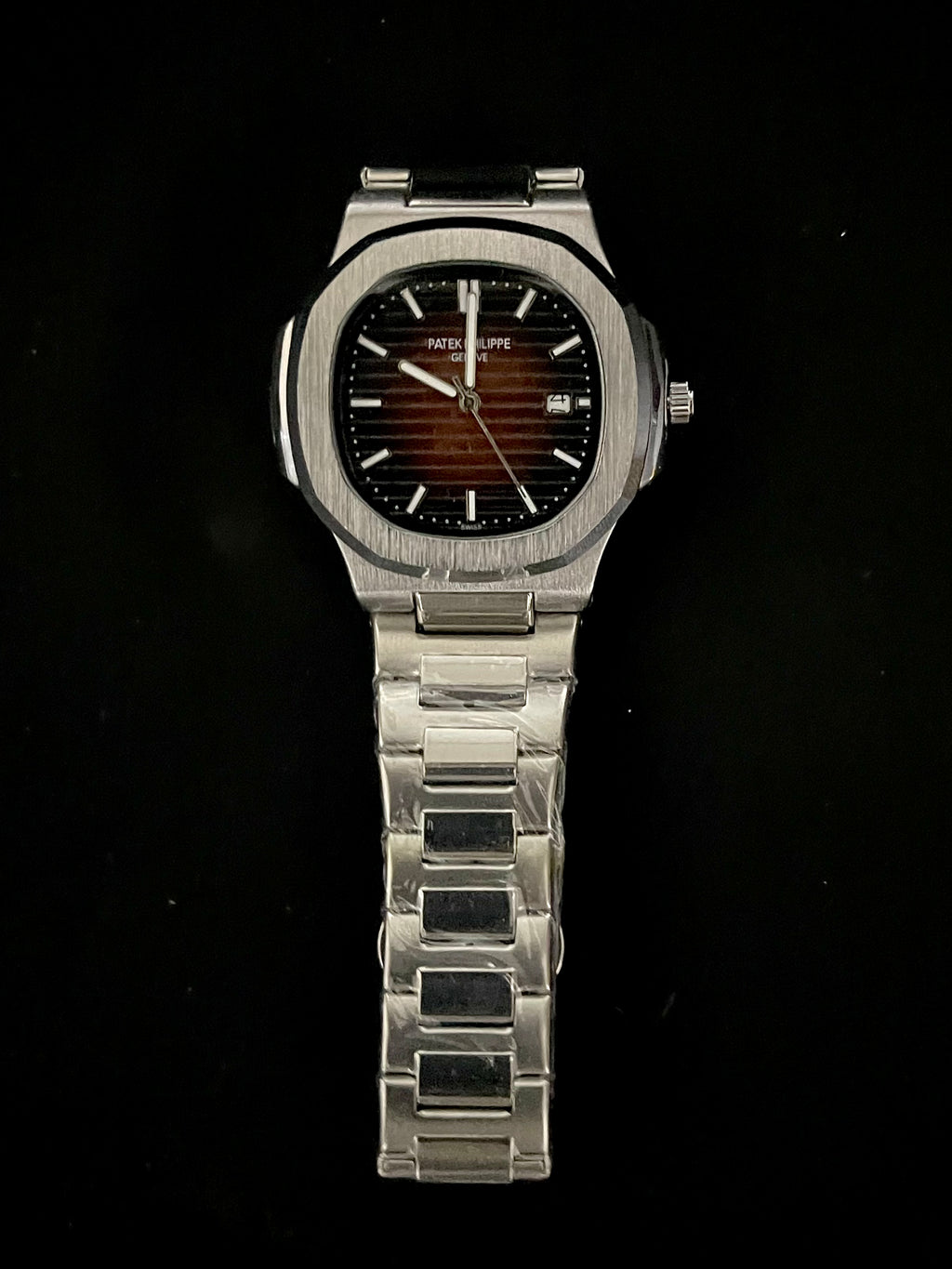 Patek Philippe Nautilus Orange Dial Stainless Steel Watch