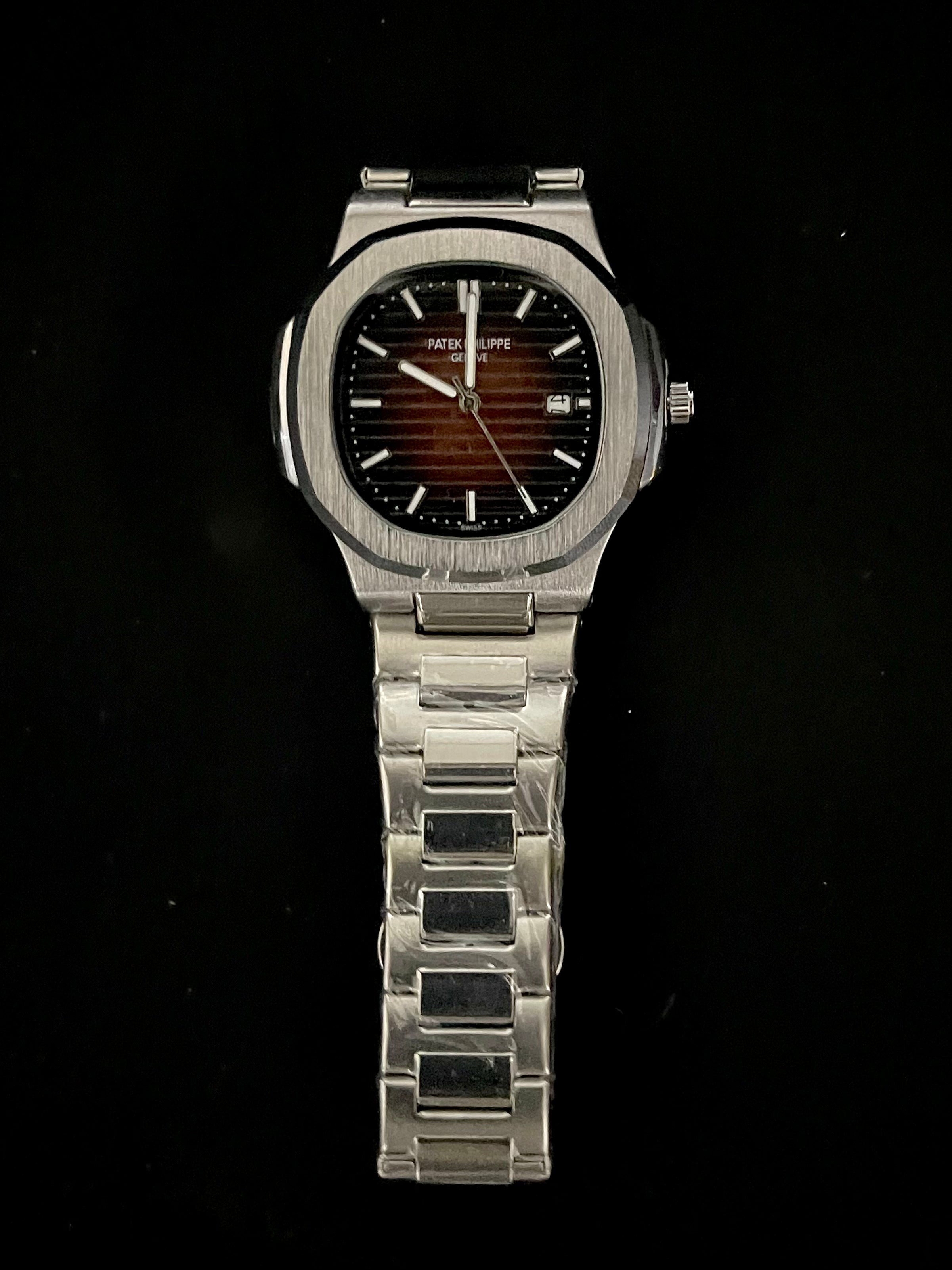Patek Philippe Nautilus Orange Dial Stainless Steel Watch